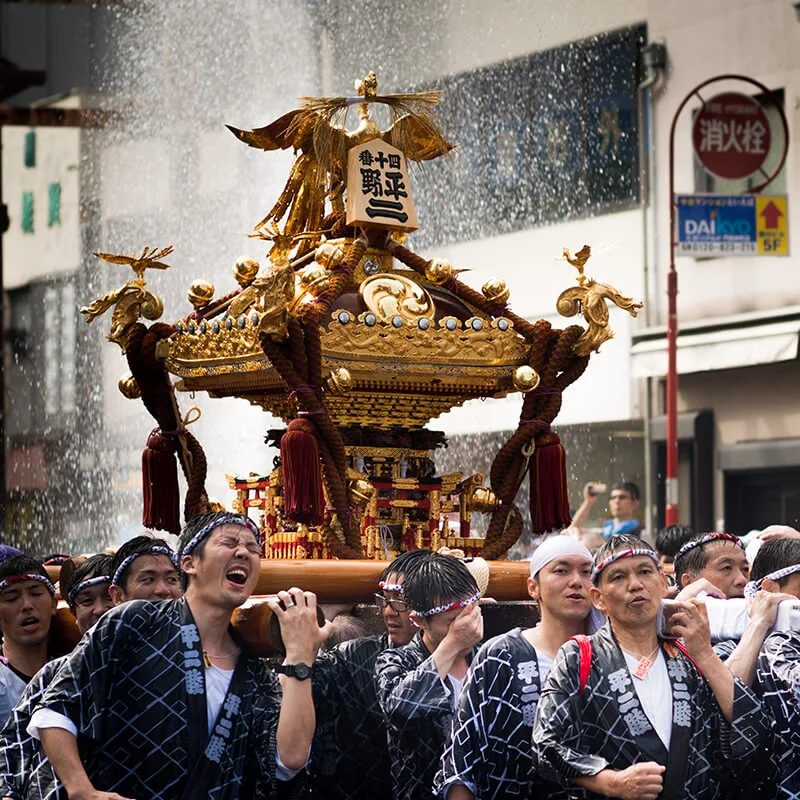 Festival mikoshi carried through the street